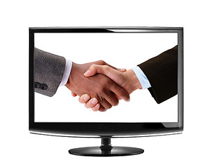 Image showing handshake in LCD monitor