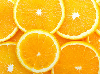 Image showing Orange slices seamless background