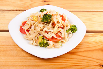 Image showing pasta salad and broccoli on white plate