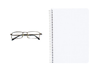 Image showing notebook and eyeglasses