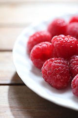 Image showing clean plate with fresh raspberries