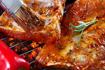 Image showing raw pork ribs on grill