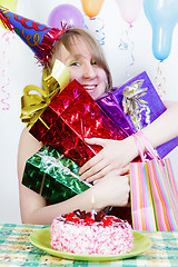 Image showing Birthday. Happy girl with gifts