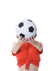 Image showing woman holding soccer ball in front of her face