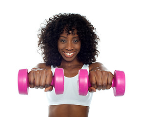 Image showing Portrait of curly haired african fit woman