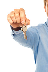Image showing Man holding keys. Shallow DOF