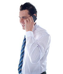 Image showing Side view of manager attending phone call