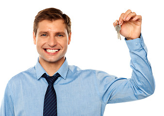 Image showing Portrait of smiling businessman holding keys