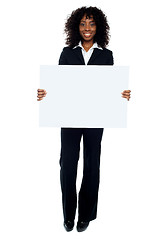 Image showing Business lady promoting big blank banner ad