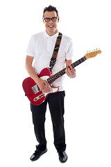 Image showing Full shot of a young man with guitar
