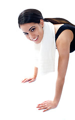 Image showing Female fitness trainer doing push ups