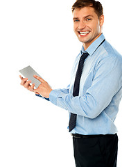 Image showing Businessman with electronic touch pad tablet