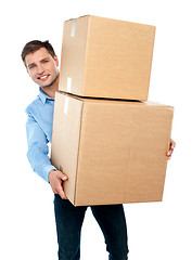 Image showing Casual man with boxes