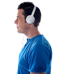 Image showing Side pose of a man with headphones