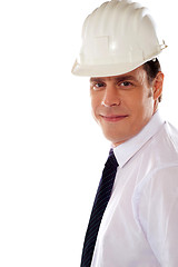 Image showing Smiling male architect wearing hard hat