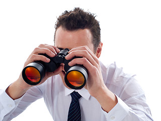 Image showing Businessman looking through binoculars