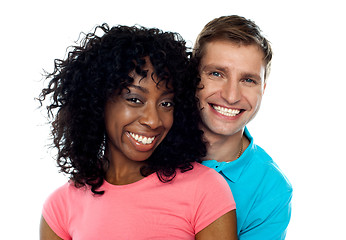 Image showing Couple smiling with joy. Hugging in love