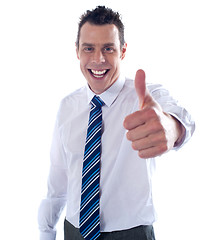 Image showing Young executive showing thumbs up
