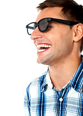 Image showing Side view of handsome smiling caucasian guy