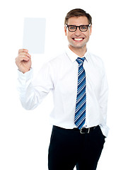 Image showing Corporate male holding blank white card