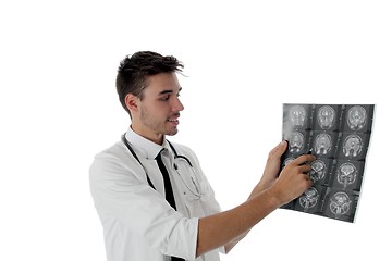 Image showing Young doctor examining an x=ray