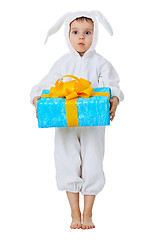 Image showing Funny boy dressed as a rabbit with a gift
