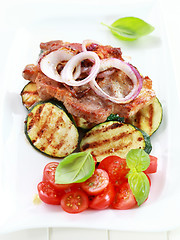 Image showing Pan-fried pork steak  with grilled vegetable