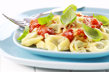 Image showing Tortellini with tomato sauce and cheese