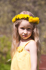 Image showing little fair-haired girl in dandelion wreath