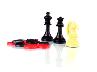 Image showing Chess and Checkers whith reflection on a white background