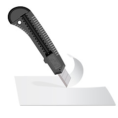 Image showing Plastic knife to cut the paper sheet of white paper.