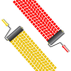 Image showing The roller draws paint from the wheel of the machine 