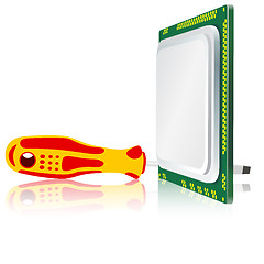 Image showing screwdriver and computer processor on a white background