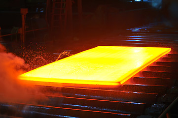 Image showing hot steel on conveyor 