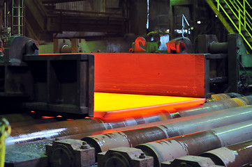 Image showing hot steel on conveyor 