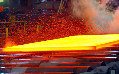 Image showing hot steel on conveyor 