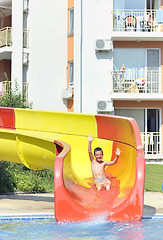 Image showing boy on a waterslide