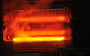 Image showing hot steel on conveyor