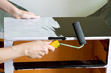 Image showing painter with paint roller