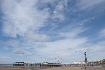 Image showing Blackpool Tower and Central Pier from the beach