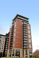 Image showing Red Black and Cream Apartments
