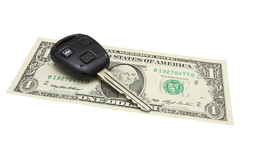 Image showing The car key lies on a dollar denomination