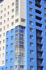 Image showing The inhabited high house against the blue sky