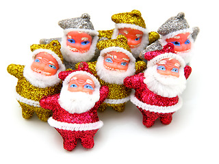 Image showing Some dolls of Santa Claus are together 