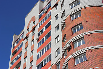 Image showing The inhabited high house against the blue sky