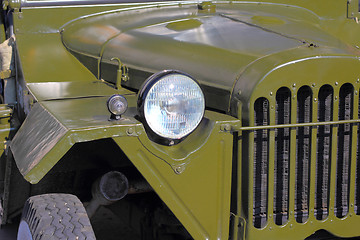 Image showing green retro car headlight