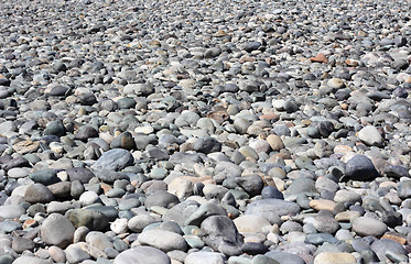 Image showing The mound of stones on the bottom of dried-up river