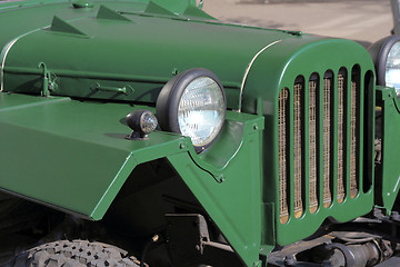 Image showing green retro car headlight