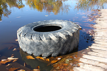 Image showing The big tire from the car.