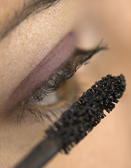 Image showing Applying make-up